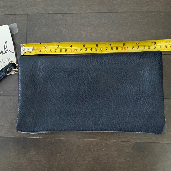 New, never worn navy blue Marlin Firenze leather wristlet/clutch. - Picture 6 of 7